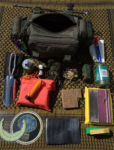 Grab bag. Main compartment contents. - ©  Gary Waidson - Ravenlore Bushcraft and Wilderness skills.